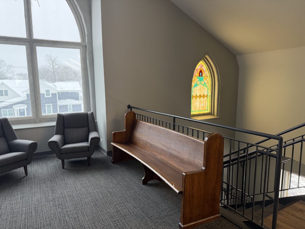 Stained glass window in a modern hallway